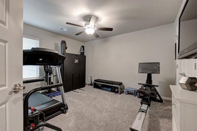 workout room with carpet floors and ceiling fan