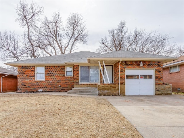 ranch-style house featuring a garage