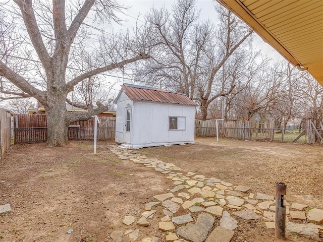 exterior space with a shed