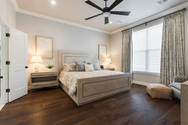 bedroom featuring ceiling fan, ornamental molding, and dark hardwood / wood-style flooring