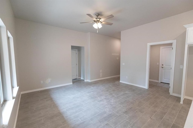 3120 Warwick Way, Moore, OK 73160 - empty room featuring a ceiling fan and light wood-style floors