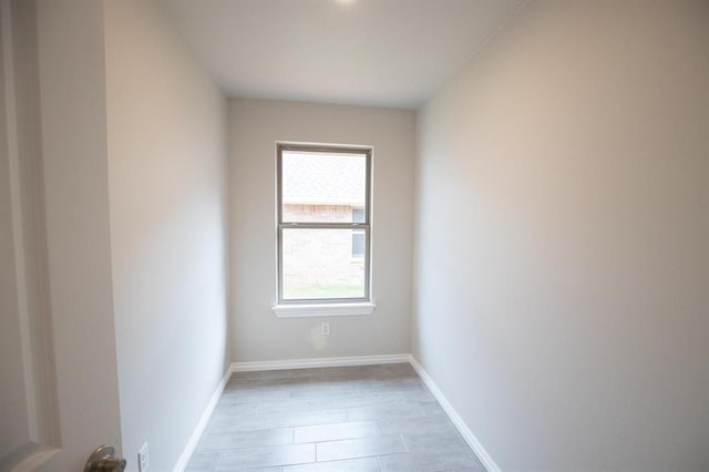 3120 Warwick Way, Moore, OK 73160 - unfurnished room with baseboards and light wood-type flooring