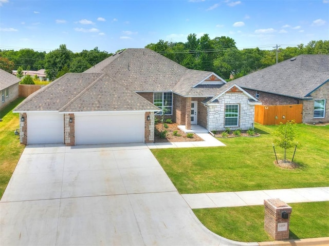 ranch-style house with a front yard and a garage