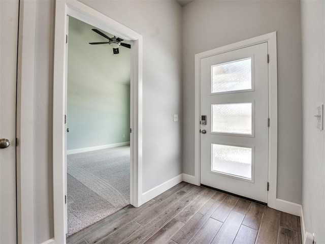 entrance foyer with ceiling fan