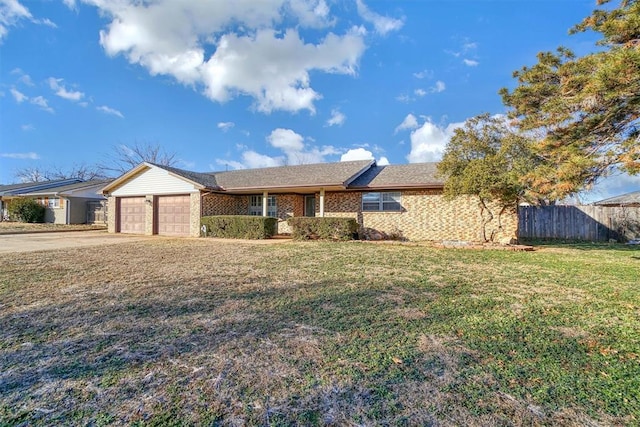 ranch-style house with a garage and a front lawn