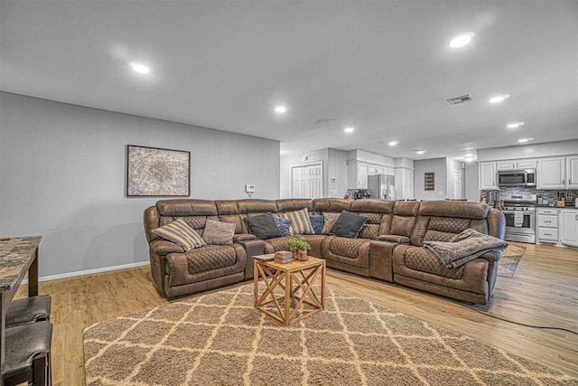 living room featuring light hardwood / wood-style flooring