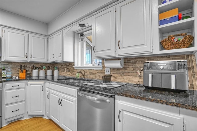 kitchen featuring white cabinets, dishwasher, light hardwood / wood-style floors, and pendant lighting