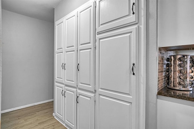 interior details featuring hardwood / wood-style flooring