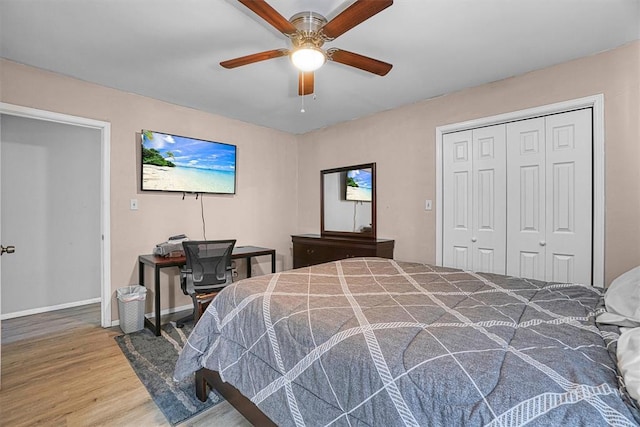 bedroom featuring a closet, ceiling fan, and wood-type flooring