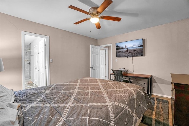 bedroom featuring ceiling fan and connected bathroom