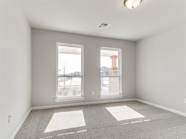 view of carpeted spare room