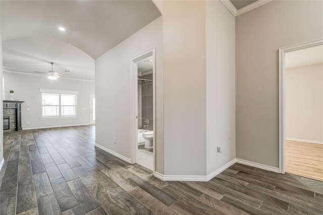 hallway featuring crown molding