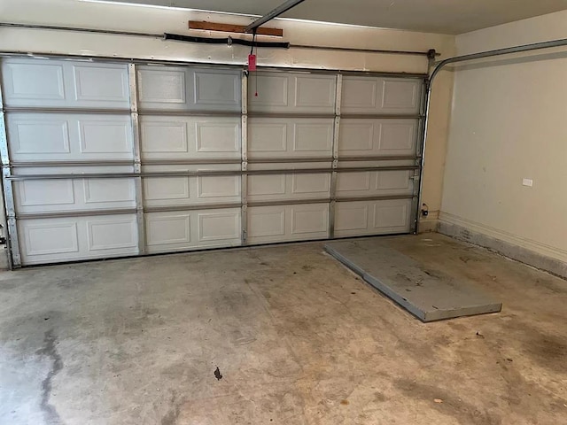 garage featuring baseboards