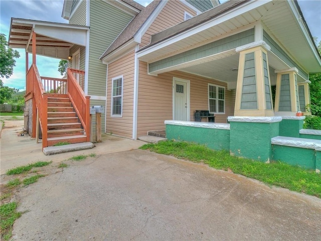 view of home's exterior featuring a porch