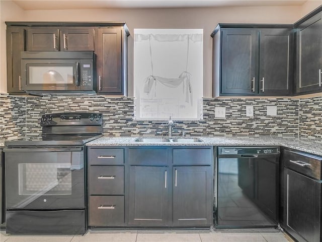 kitchen with sink, backsplash, and black appliances