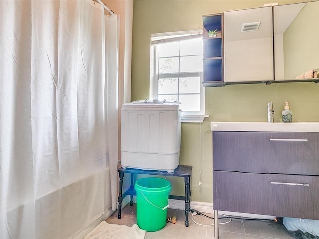 bathroom featuring shower / bath combination with curtain