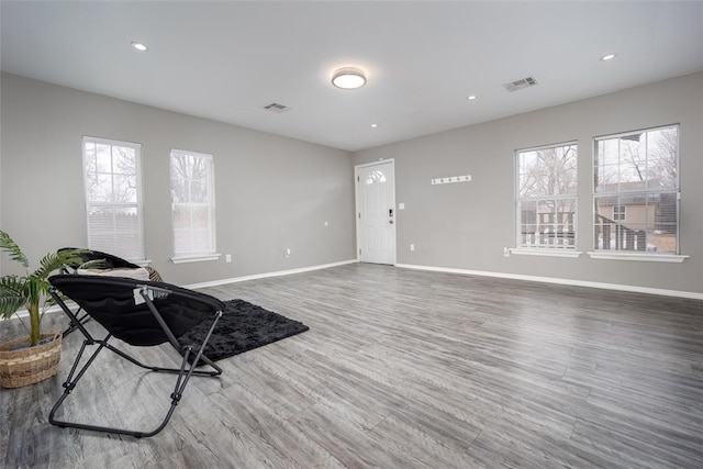 interior space with hardwood / wood-style flooring