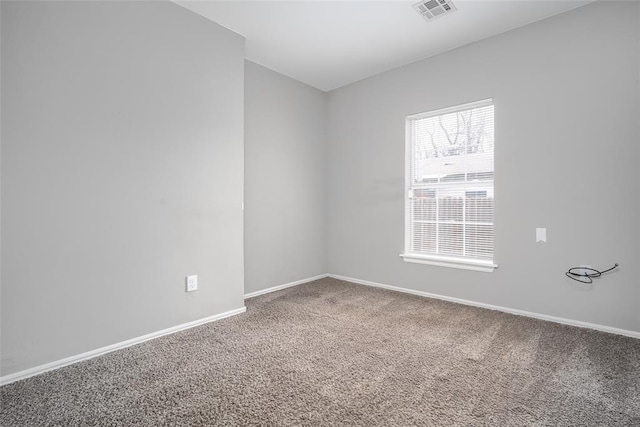 spare room with carpet flooring