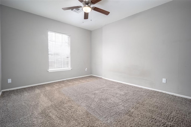 unfurnished room featuring carpet floors and ceiling fan