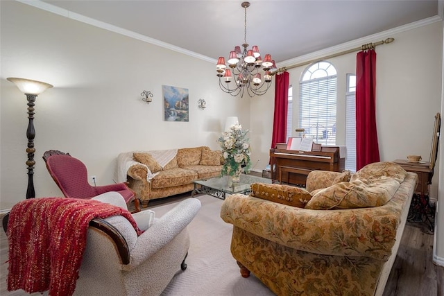 living area with a chandelier, crown molding, and wood finished floors