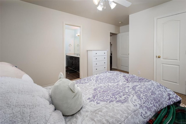 bedroom with a ceiling fan and ensuite bathroom