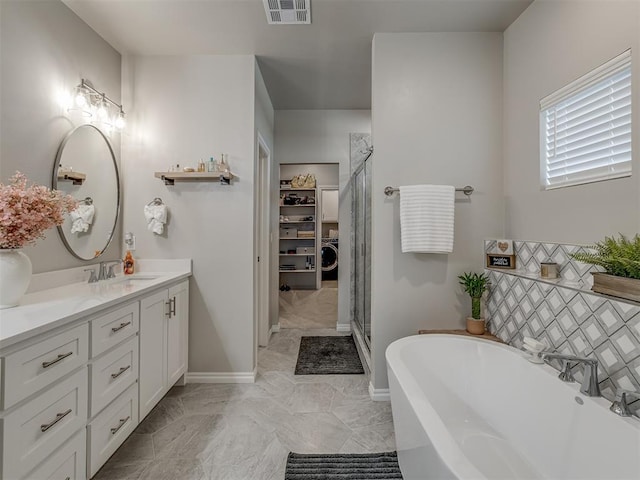 bathroom featuring vanity and plus walk in shower