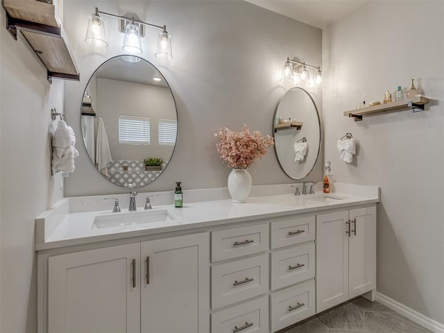 bathroom with vanity and tile patterned floors