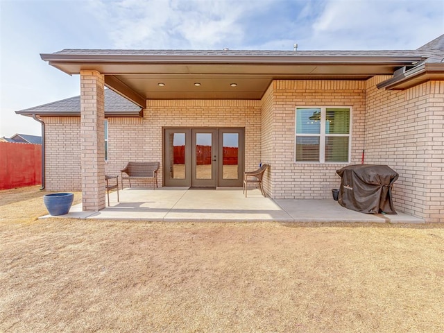 back of property featuring a patio area