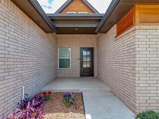 9312 Taggert Ln, Yukon, OK 73099 - property entrance featuring brick siding