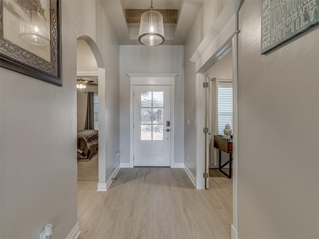 9312 Taggert Ln, Yukon, OK 73099 - entrance foyer featuring wood finished floors, arched walkways, and baseboards