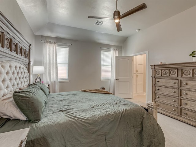 9312 Taggert Ln, Yukon, OK 73099 - bedroom featuring light carpet, lofted ceiling, and ceiling fan
