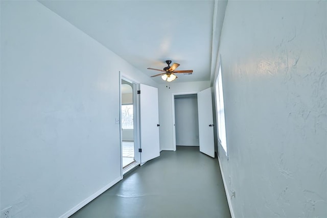 spare room with ceiling fan