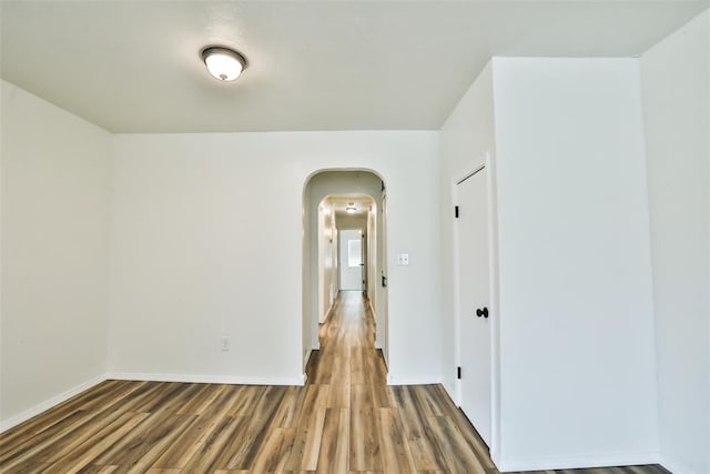 spare room featuring hardwood / wood-style floors