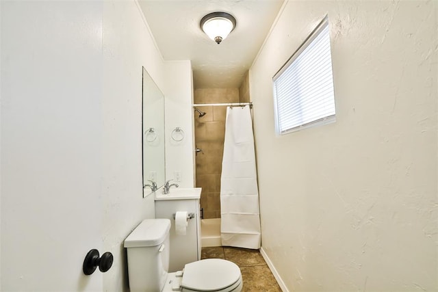 bathroom with curtained shower, toilet, and tile patterned flooring