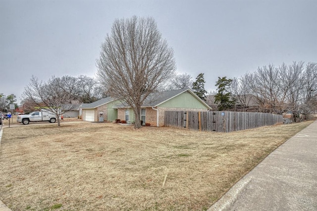 view of yard featuring a garage