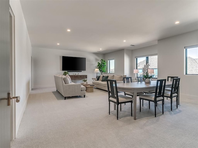 view of carpeted dining area