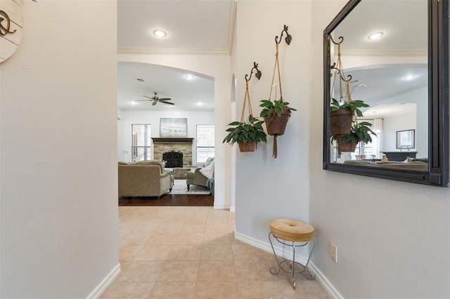 corridor featuring light tile patterned flooring