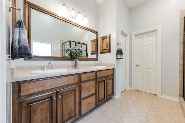 bathroom with vanity and tile patterned floors