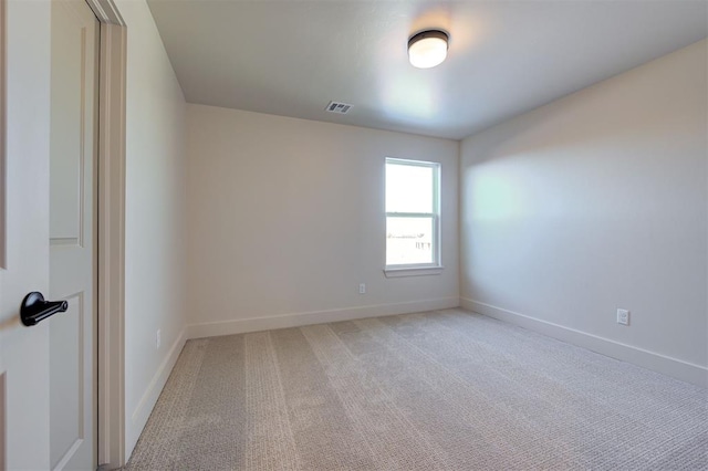 spare room featuring carpet flooring