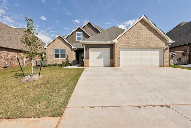 view of front facade featuring a front lawn and a garage