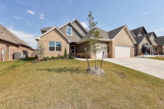 craftsman house featuring central AC unit, a front lawn, and a garage