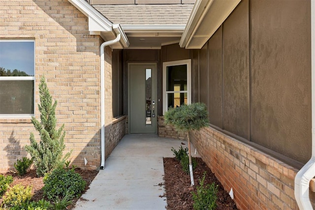 property entrance featuring a patio area