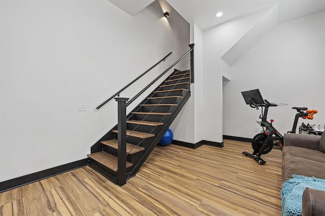 workout room featuring hardwood / wood-style floors