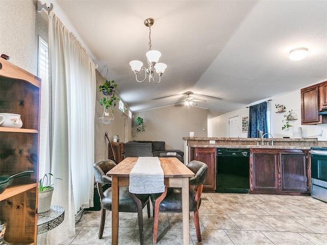 dining area featuring vaulted ceiling, sink, and ceiling fan with notable chandelier