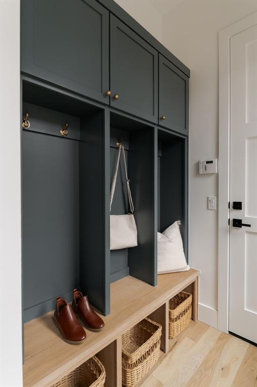 mudroom with light wood-type flooring