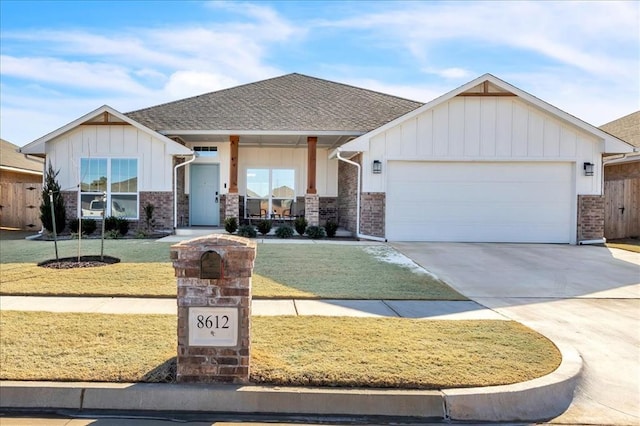 craftsman-style home with a garage, a front yard, and a porch