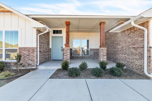 entrance to property with a porch