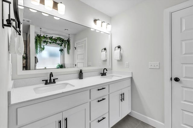 bathroom featuring vanity and tile patterned flooring