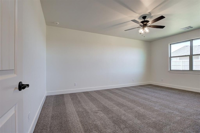 carpeted empty room with ceiling fan