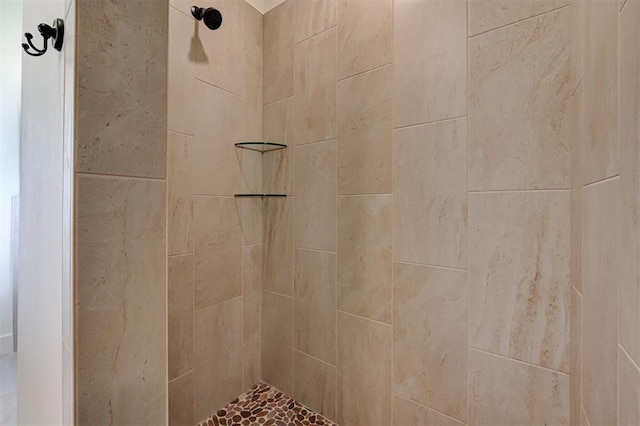 details featuring a tile shower